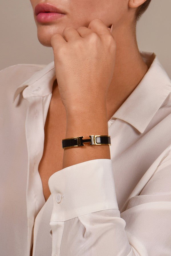 BRACELET HERMES CLIC H NOIR DOREE