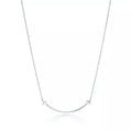 COLLIER TIFFANY & CO T PENDENTIF SMILE WHITE GOLD