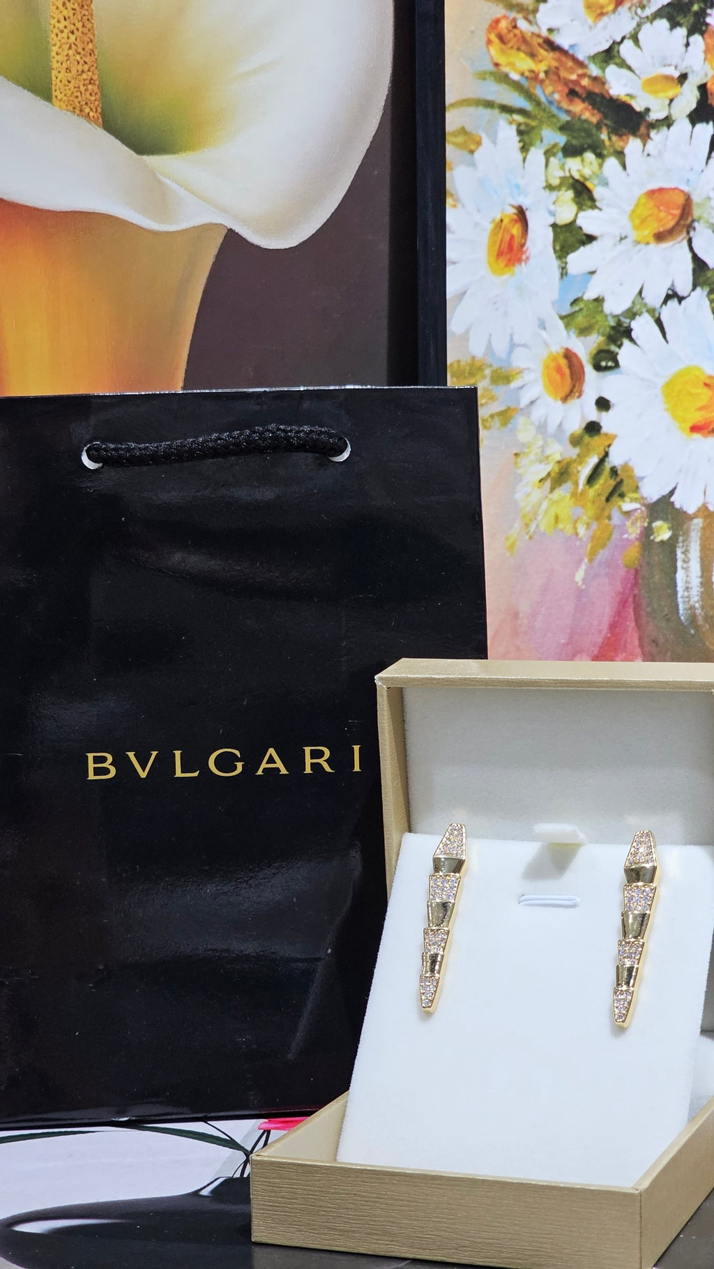 boucles  femme BVLGARI