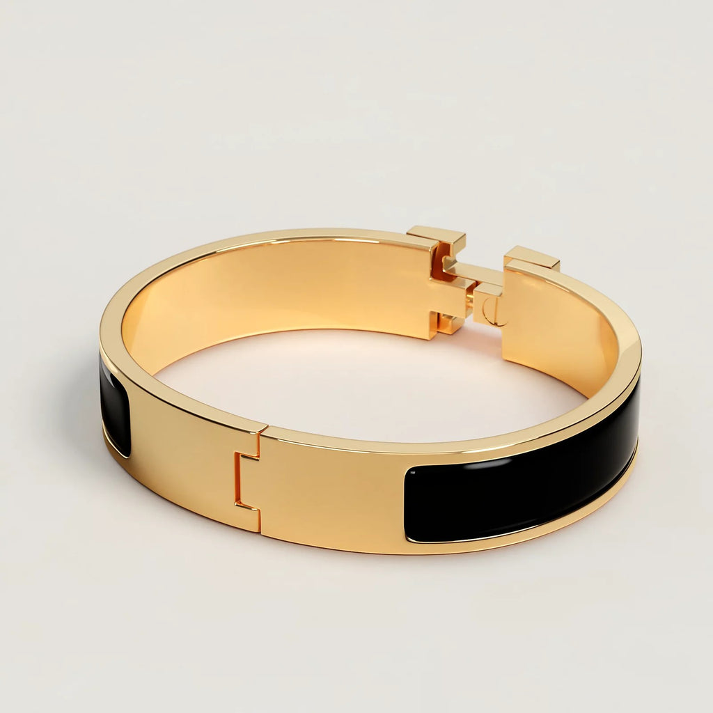 BRACELET HERMES CLIC H NOIR DOREE