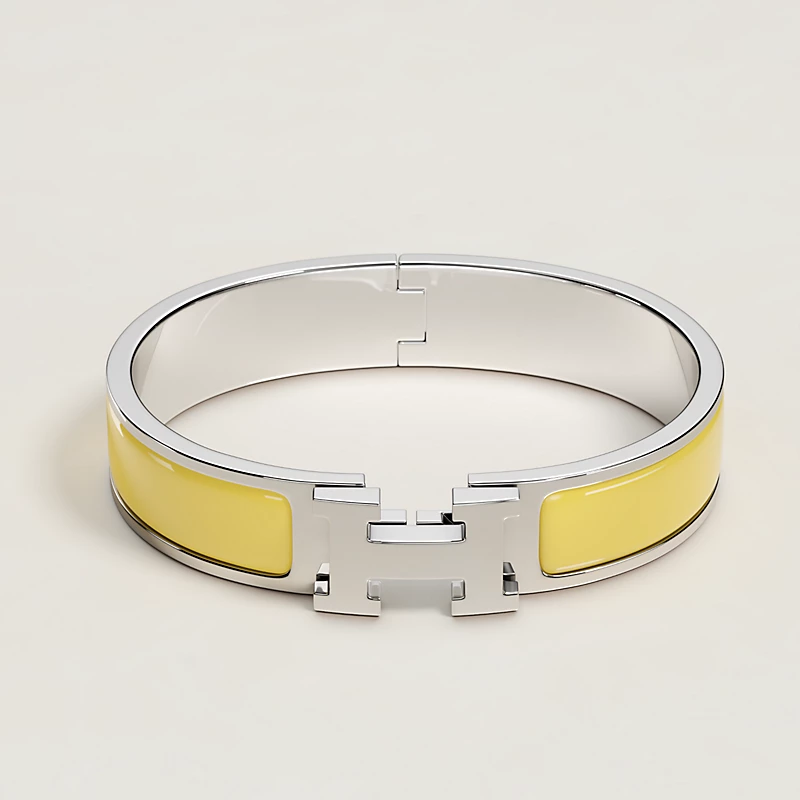 BRACELET HERMES CLIC H JAUNE D'OR ARGENTE