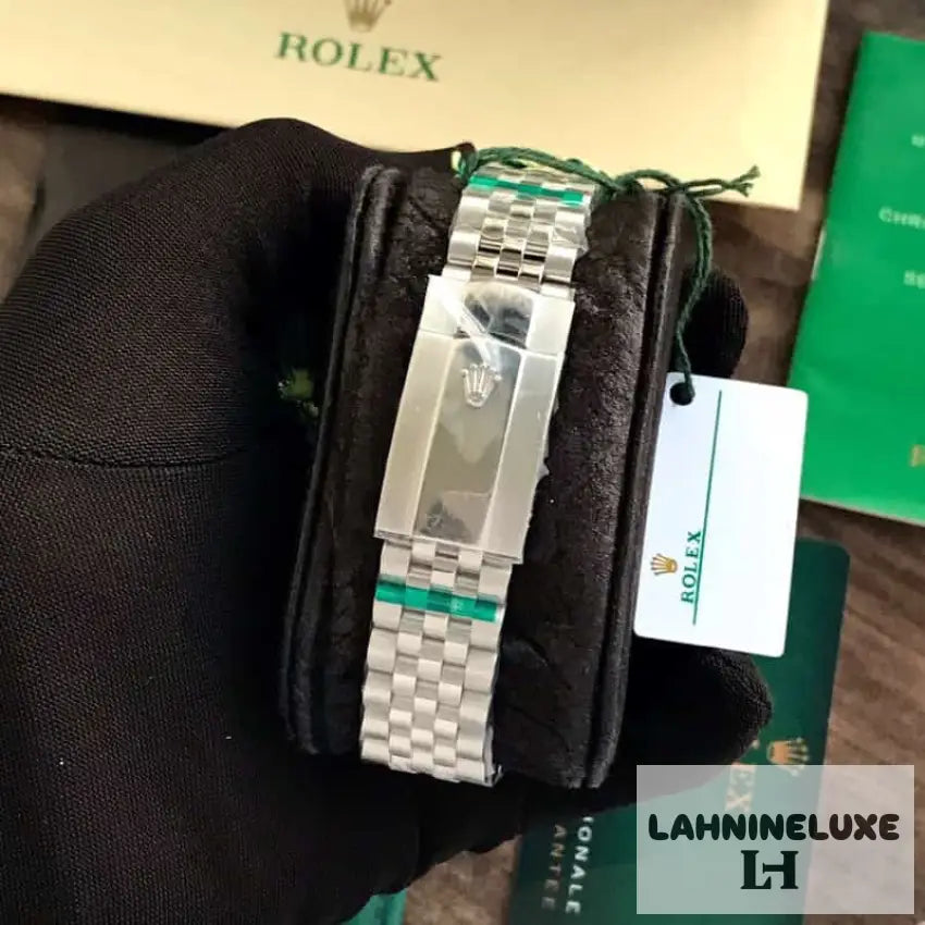 Rolex Date Just 41 Blue Motif Index Dial Fluted Bezel Jubilee Stainless